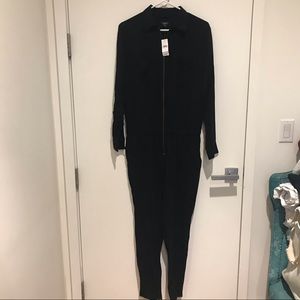 Loft Long sleeve black romper never worn